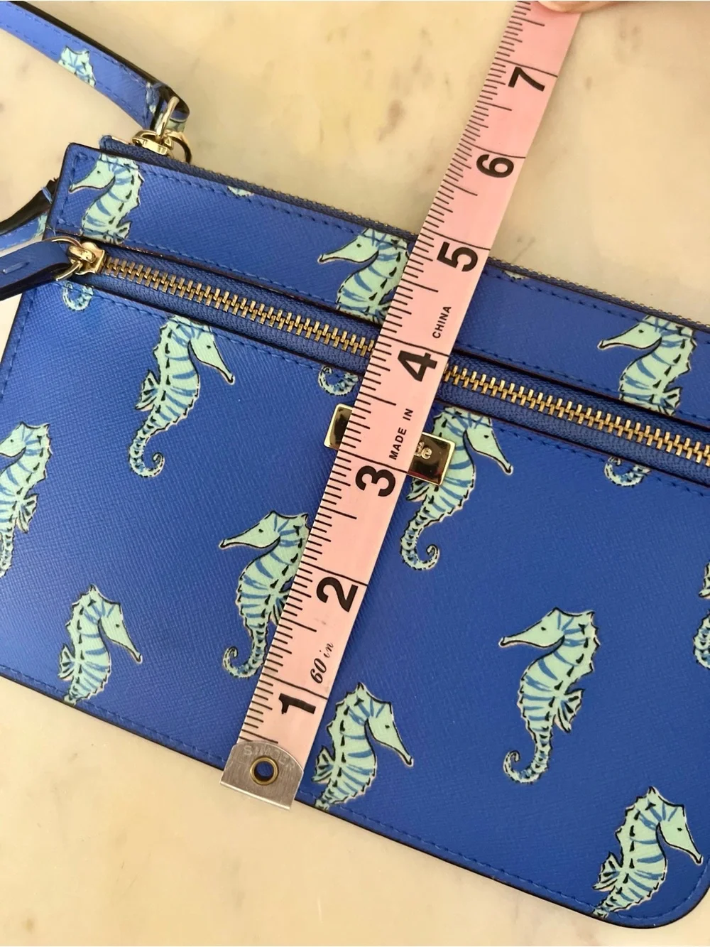 kate spade cobalt blue seahorse wristlet clutch